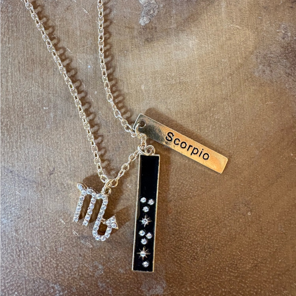 Claire’s Scorpio necklace